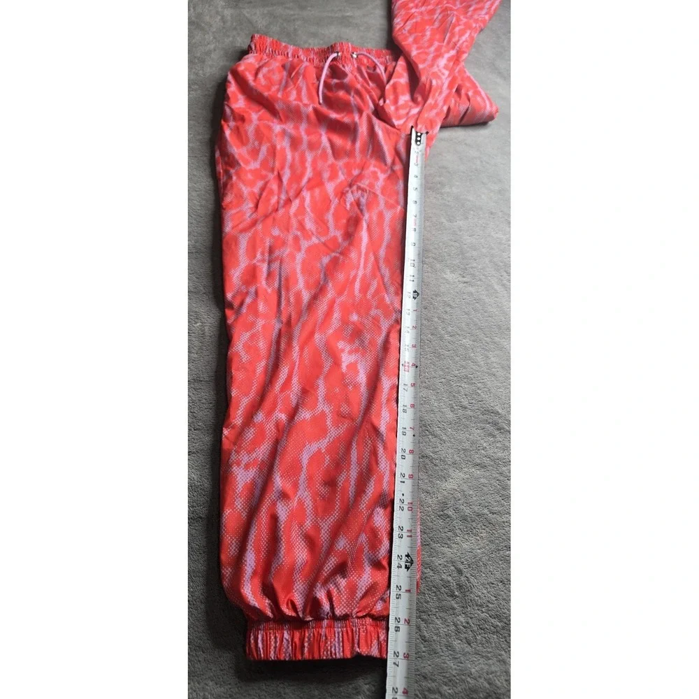 Nike Sportswear Woven Training Jogger Pants Women Small Orange Pink Animal Print